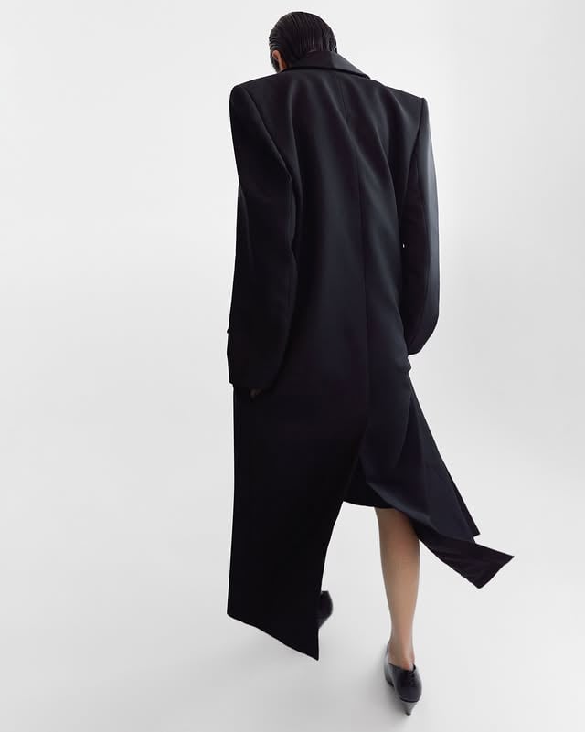 For every occasion. The Natalini Coat layered over the Contour Leather Skirt, a modern heirloom. Available now at camillaandmarc.com and in boutiques. by @camillaandmarc