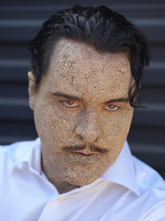 Sandman from Spider Noir portrayed by the amazing @thejackhuston 
When we were brought onto Spider Noir, the sandman was our first order of business. After a variety of testing, I opted to essentially have us sculpt a likeness of Jack, on Jack with this gritty sand like texture over his entire skin. He is wearing a 10 piece overlapping silicone prosthetic makeup- with lace brows and mustache and full foam latex gloves. Sculpture work by @dantiri who also handled all of the scans and prints. Mold work lead by mold shop supervisor @carl_lyon_ with @rob_freitas_ @adeleanor @ajvenuto @el_tony_ftw silicone prosthetics headed up by @willdaemon and @s_imhoff_art foam castings by @trippytv patching by @mikefx brows and mustache by @sasha_camacho operations @monsterdestroyerfx studio coordinator @monsterwalsh 
When this character came up, I thought of my friend @cnelsonfx straight away to come help develop this paint job and establish the makeup. After testing a few things- we decided on casting the prosthetics in a dark chocolate like brown- acting as a deep opaque undertone for all other color work to sit atop this and allow for great depth. Chris pre painted all of the prosthetics for this test you see in the first 4 images that he applied along with @ozzyalvarezfx they both were able to do a few days to get the ball rolling when then @kniederbaumer stepped in, who also handled heading up the makeup effects onset for this show. Ken  applied this makeup with Ozzy or @snyder_makeup_man depending on the day. 
Big thank you to makeup dept head @lanahorochowski for bringing us along for the ride on this amazing show. Great challenge and very rewarding! #spidernoir #sandman #makeupfx #prosthetics #vincentvandykefx