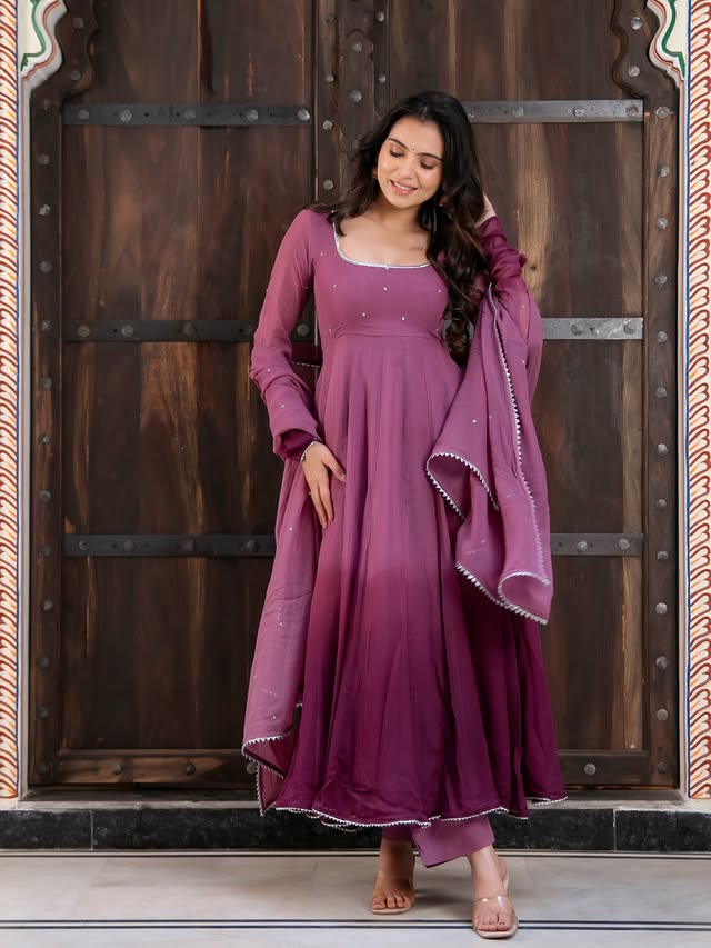 ✨🪷NEW ARRIVAL🪷✨~Pari Suit Set~POV: You wanted something unique, and this plum beauty understood the assignment 💜✨This dreamy ombré-inspired plum shade is serving elegance, softness, and main character energy all at once 💫The flowy silhouette, delicate sparkle detailing, and that gorgeous gradient effect make every twirl look straight out of a movie scene 🎬💃Order via our website link in bio "bhaviniparis.com" 🔗#luxuryethnicwear #celebstyle #anarkalisuits #festivewear #ethnicwearonline (red anarkali suit, georgette anarkali, designer red suit set, festive wear for women, wedding guest outfit, party wear anarkali, zari embroidery suit, sequin work anarkali, classic red ethnic wear, elegant indian outfit, flowy anarkali dress, traditional festive outfit, georgette dupatta set, cotton lining kurta, wedding function outfit, graceful ethnic look, twirl worthy dress, premium ethnic wear, women’s ethnic fashion, festive party outfit) by @bhaviniparis