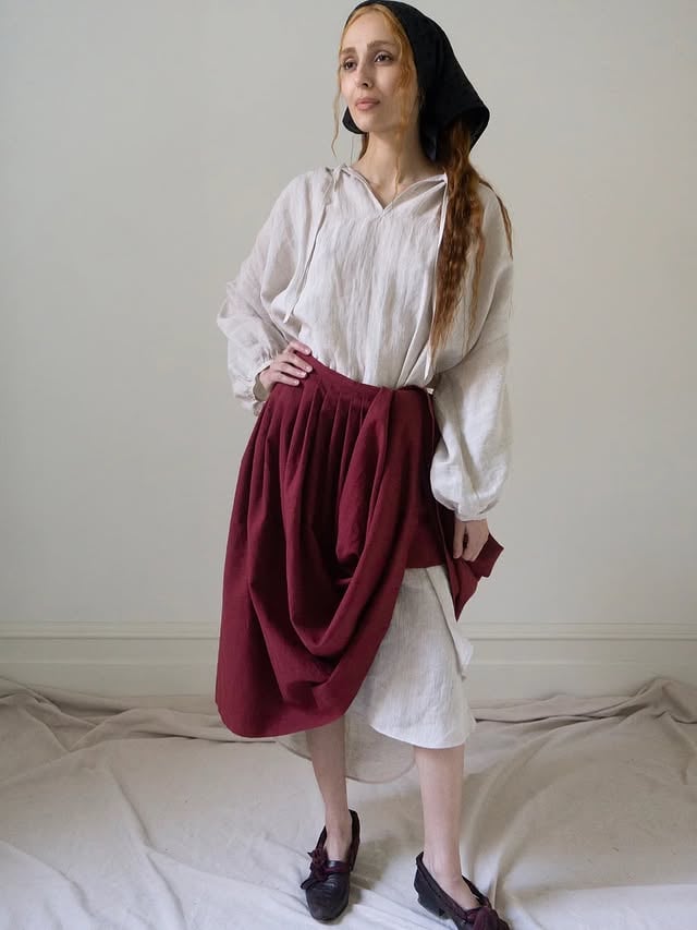 Elleri skirt in dark red, over Orion dress in ecru. 🤍 by @ovate