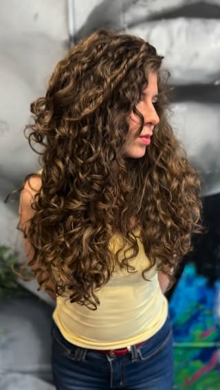 Very Long Curly Hair Transformation ✂️✨
My model, @yanettsteven , has incredibly long, thick curls, and I wanted to showcase that beautiful length with a soft V shaped cut and carefully placed layers to create more lift, movement, and bounce throughout the hair. 🙌💛

To style and define these gorgeous curls, I used: @OnlyCurls Cleanser, Conditioner, Leave in Cream and Enhancing Curl Gel. 
A huge thank you to @thecurlyscott for hosting me at his amazing salon in Glasgow. It was a pleasure working alongside Scott and his fantastic team at @thebbhaircollective . 💫

#naturalcurls #curlspecialist aberystwyth #curlyhairspecialist curlyhair cyrlcymru glasgowsalon 
riccioli locken bukleler rizo Merida curlroutine curlcymru hjloves hairtips hairbrained ittakesapro licensedtocreate lowporosityhair #mermaidhair #longcurlyhair